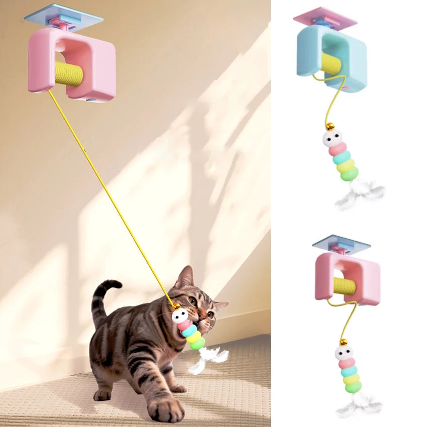 Tabby cat batting a rechargeable hanging door cat toy on an elastic string, shown in pink and blue